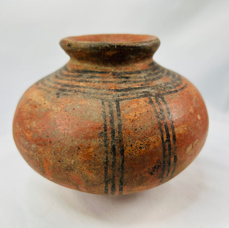 Authentic African tribal clay pot with bold black motif and aged patina