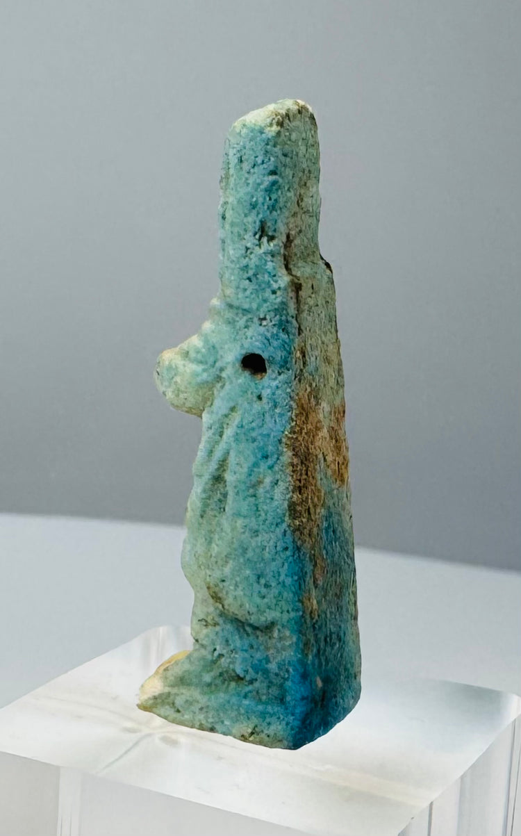 Late Period Taweret amulet showing a prominent abdomen and composite animal features