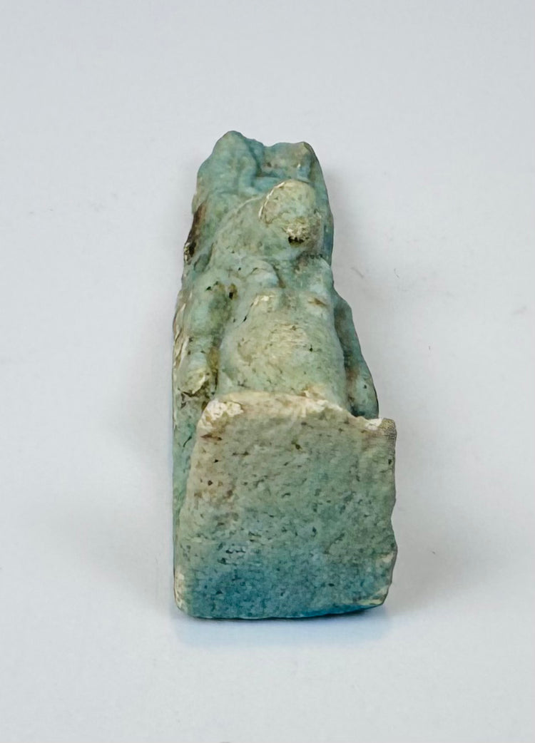 Base view of an ancient Egyptian faience Taweret amulet measuring approximately 1.6 inches tall