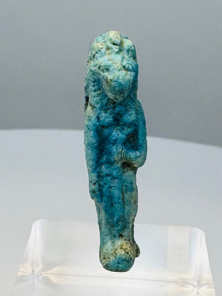 Side profile of an ancient Egyptian Sekhmet-attributed amulet with a projecting feline muzzle