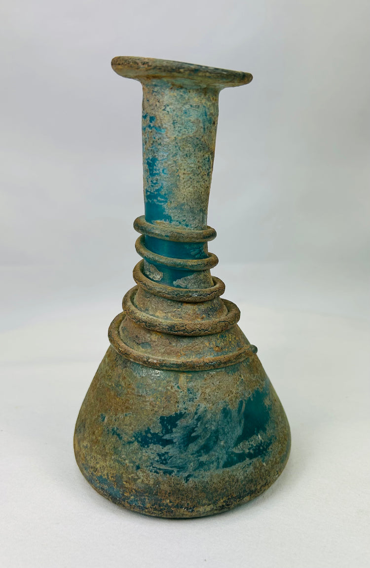 Museum-quality Roman glass unguentarium with flared rim and elongated neck