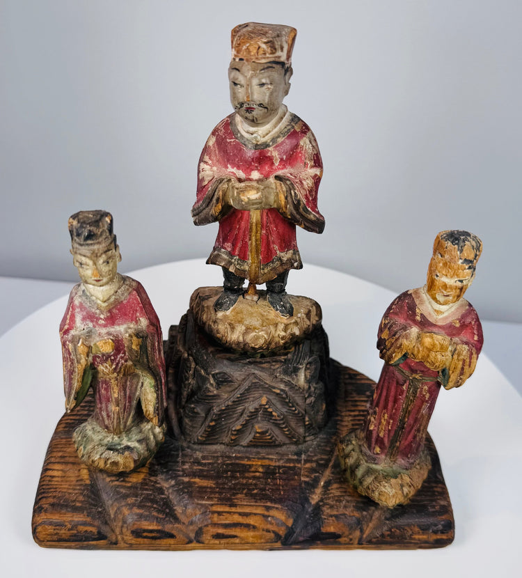 Hand-carved Chinese shrine ensemble displaying layered architectural construction and ritual symbolism