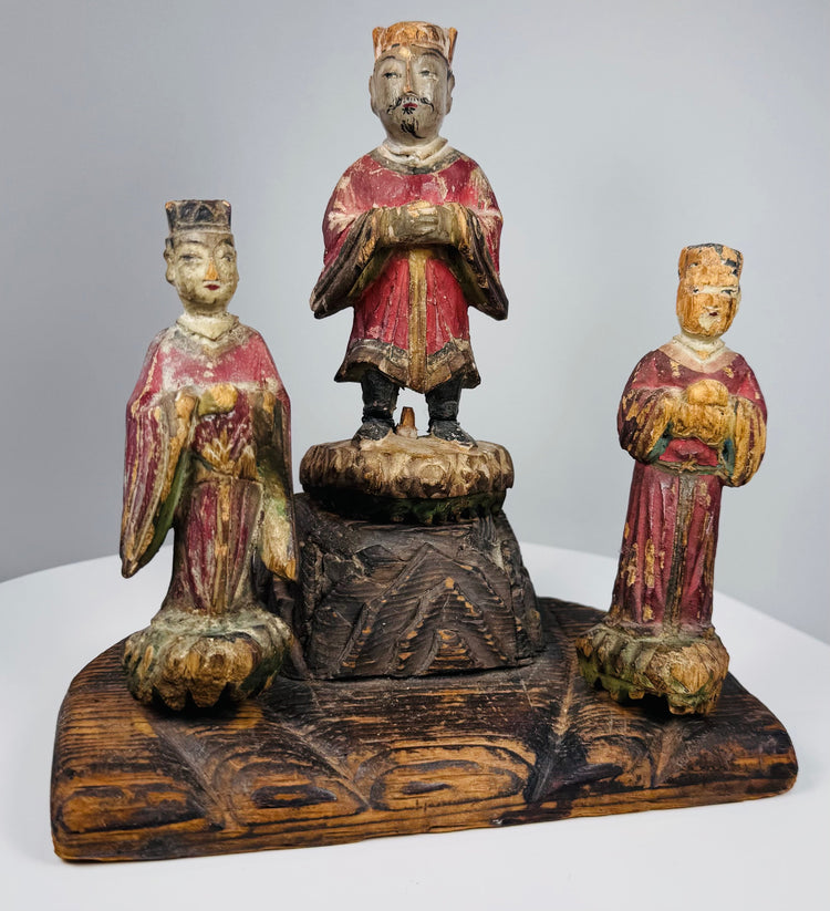 Late Qing Dynasty Chinese devotional carving with three painted figures arranged on an architectural base