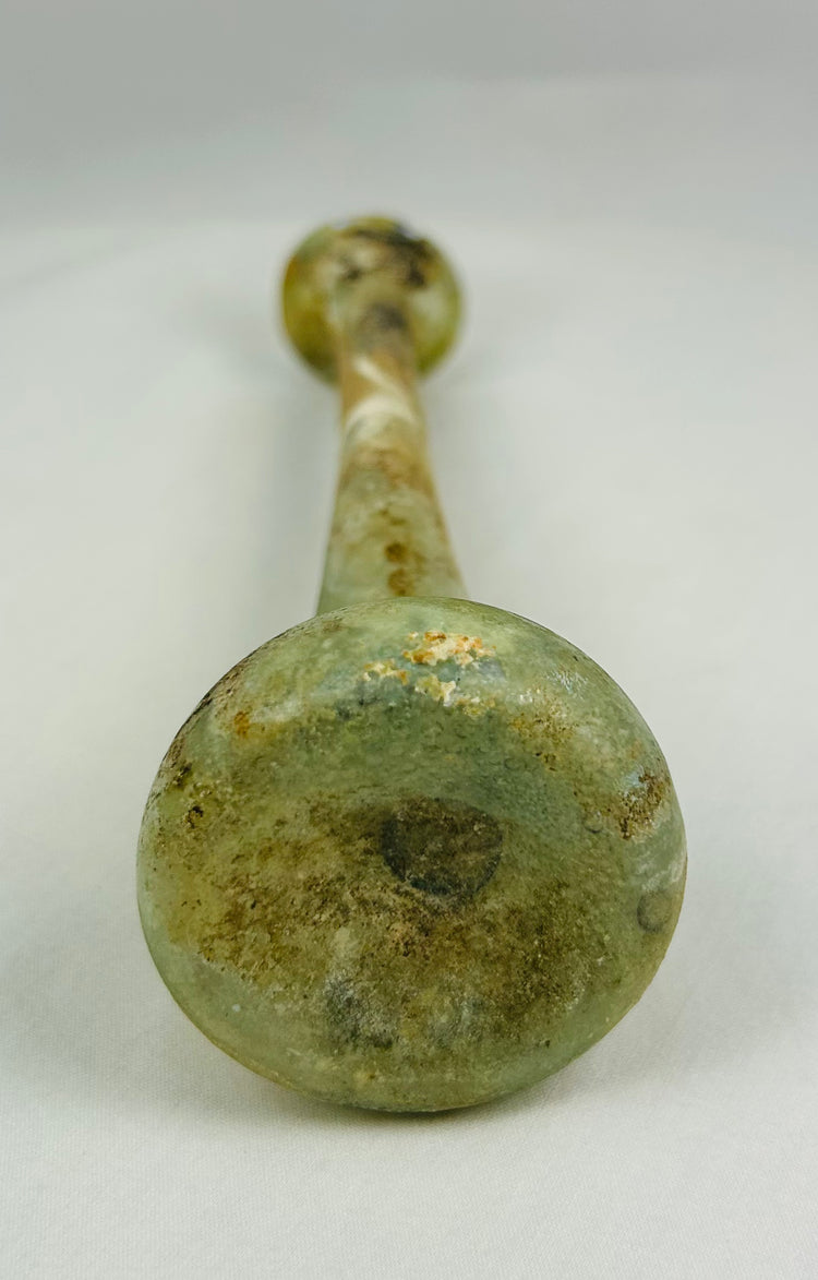 Well-preserved ancient Roman glass perfume vessel with elegant classical form