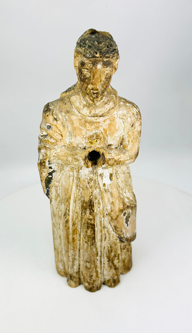 Spanish or Spanish Colonial carved wooden Santos relic symbolizing lived faith