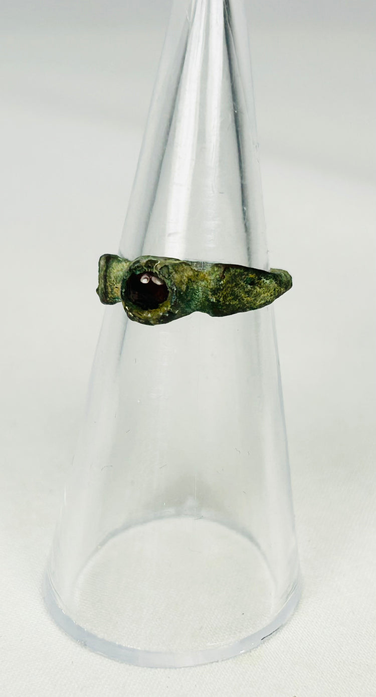 Side view of ancient Roman bronze ring highlighting bezel depth and gemstone setting