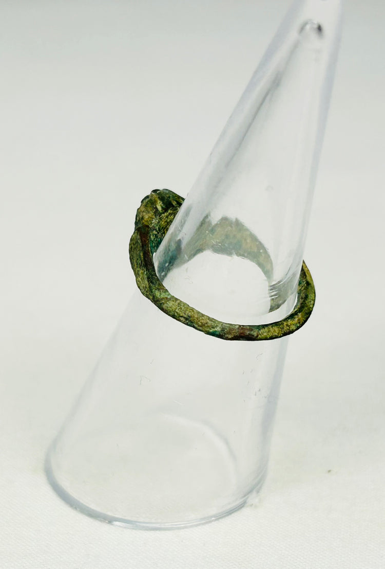 Rear view of 2nd-century Roman bronze ring showing sculpted shoulders and gemstone clarity