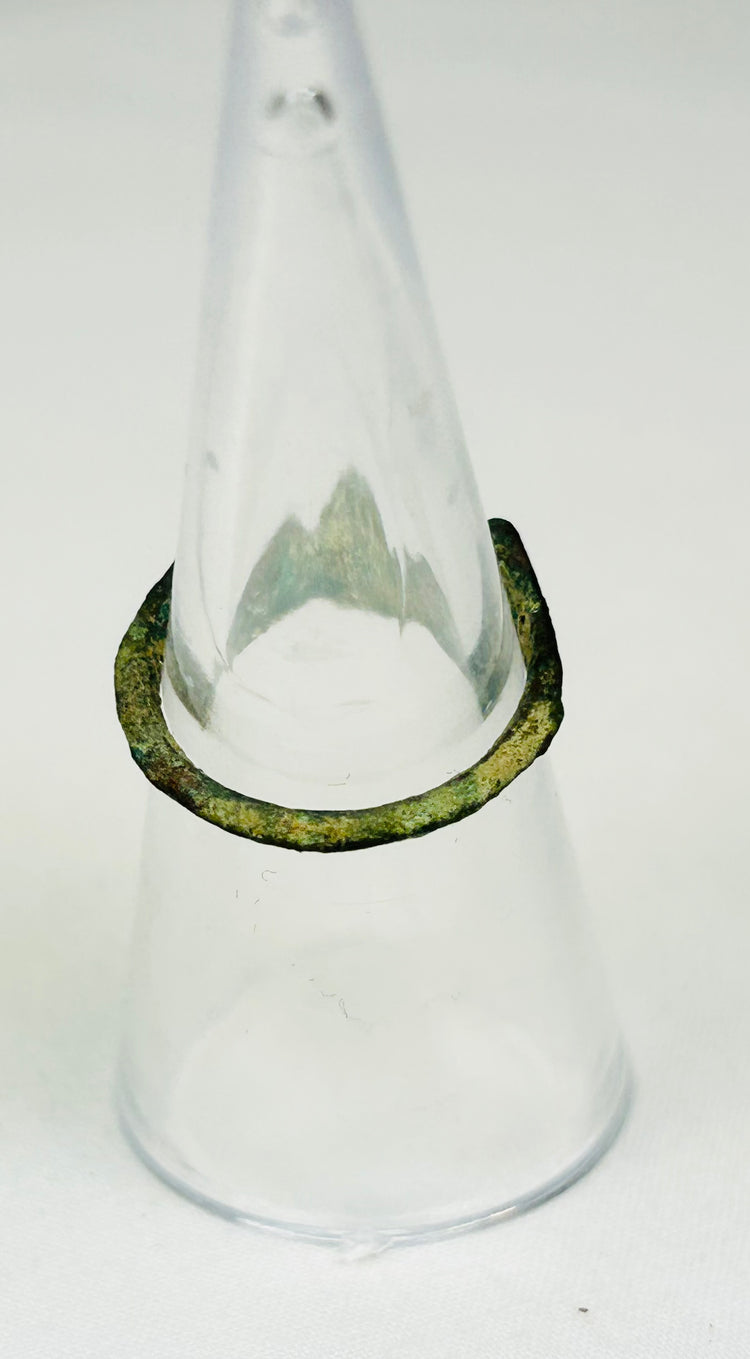 Back view of 2nd-century Roman bronze ring showing sculpted shoulders and gemstone clarity