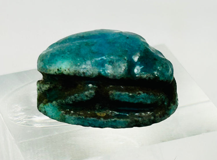 Detailed image of Egyptian scarab artifact showing surface texture and ancient wear