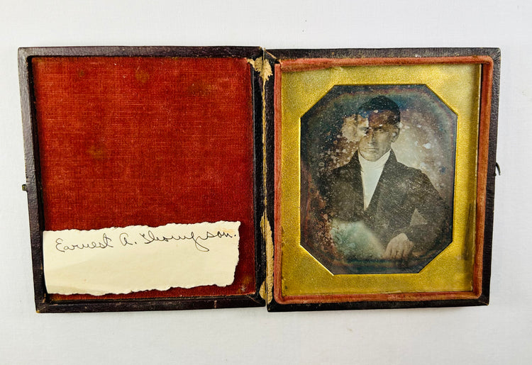 Military remembrance archive including medals, Bible relics, photographs, and naval history