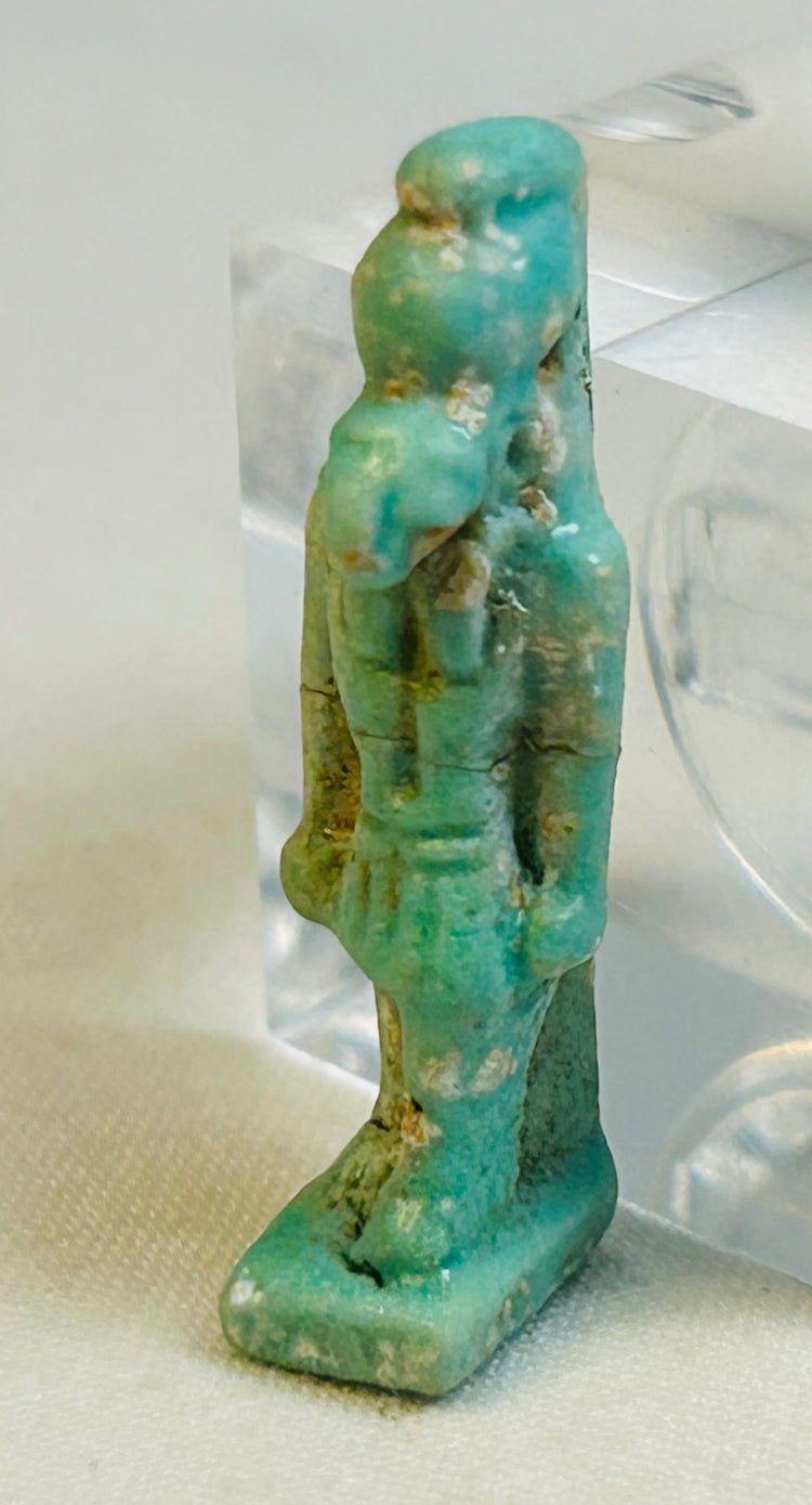 Small blue-green faience figure of falcon god Horus from Late to Ptolemaic Egypt