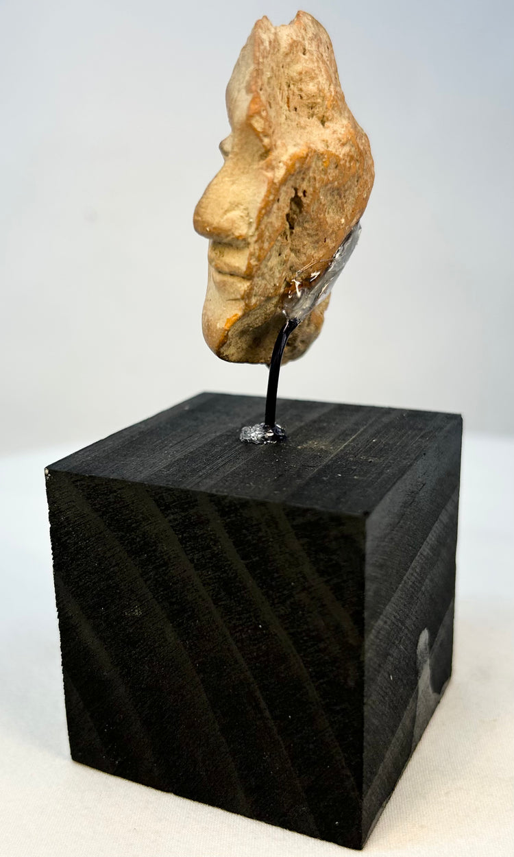 Ancient terracotta portrait sculpture fragment from Classical world