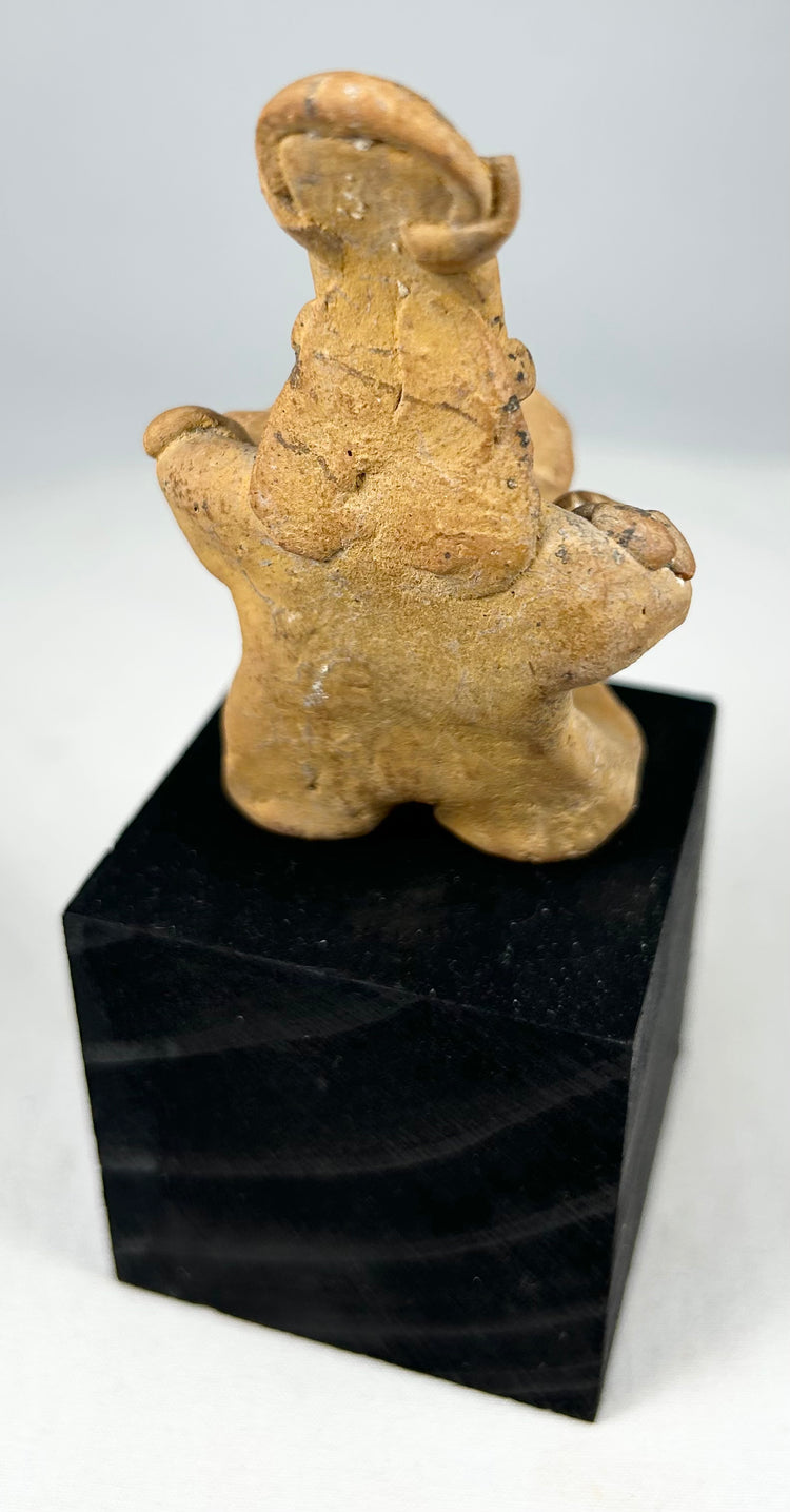 Authentic ancient West Mexico terracotta effigy of a drummer with headdress, necklace, and ritual symbolism