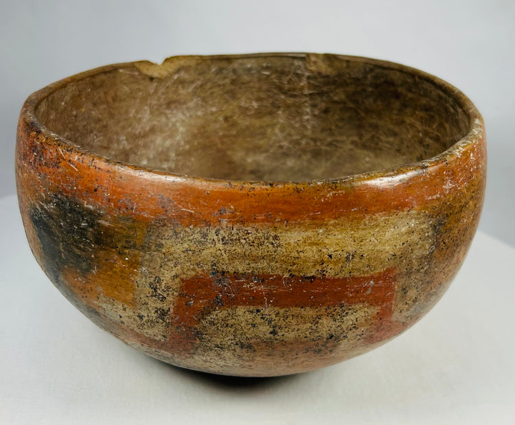 Ancient West Mexican pottery bowl with burnished red and ochre surface