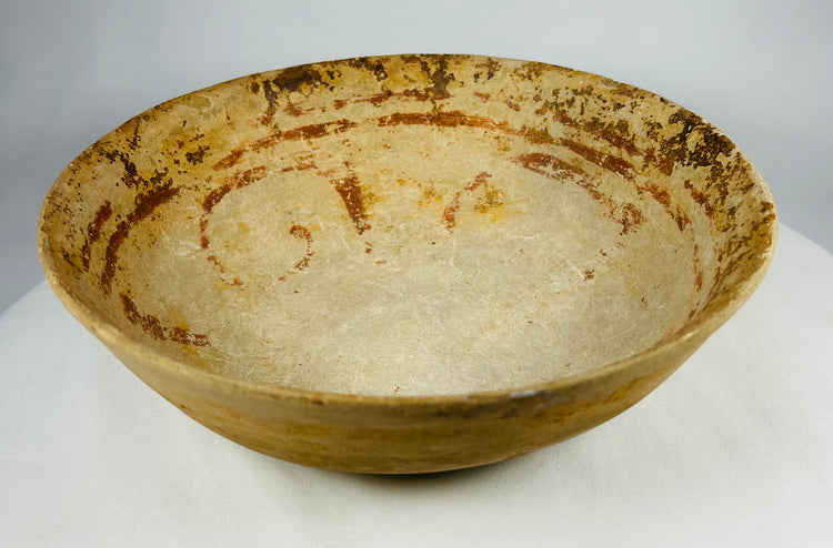 Pre-Columbian terracotta bowl from the Americas showing ancient craftsmanship and ritual character.