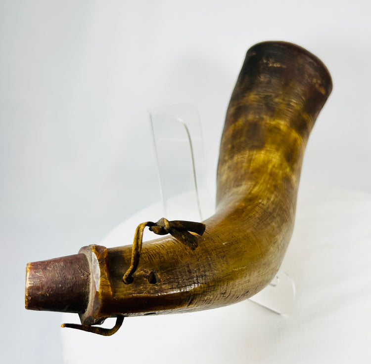 Close-up of wooden base plug on historic firearms powder horn