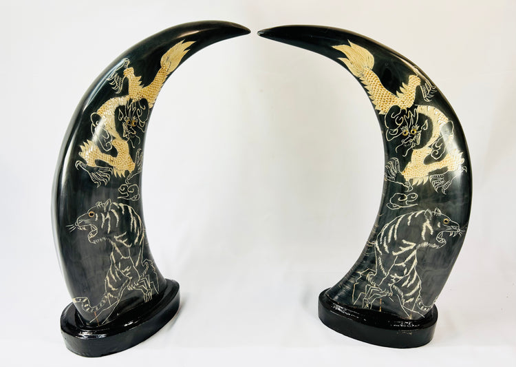 Mid–late 20th-century East Asian water buffalo horn sculptures with etched gold celestial dragons and tigers, circa 1960–1980