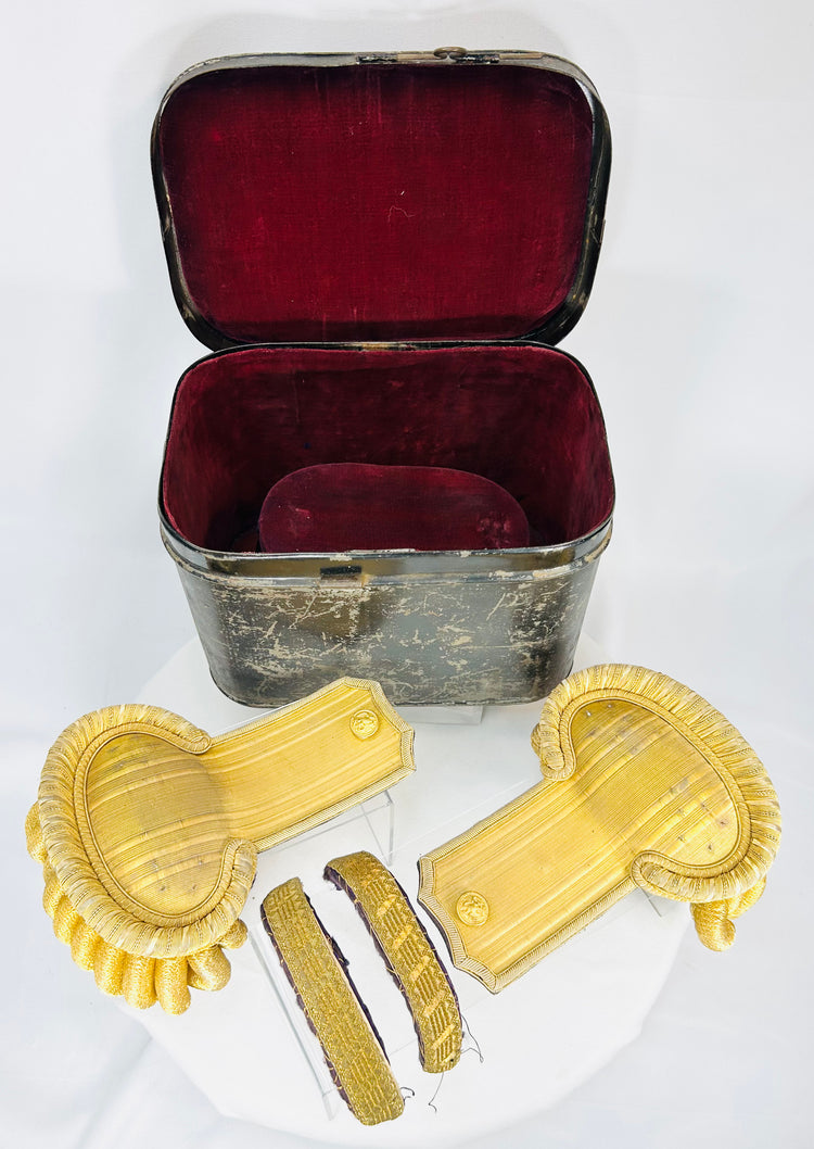 Pair of antique naval officer shoulder epaulettes housed in crimson velvet presentation case