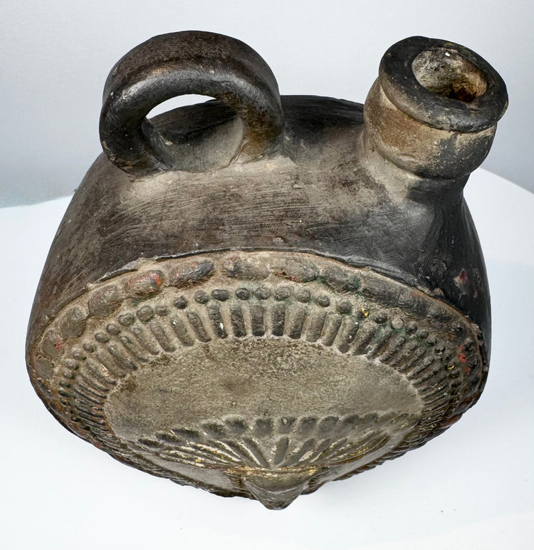 Pre-Columbian ceramic canteen with loop handle and short pouring spout