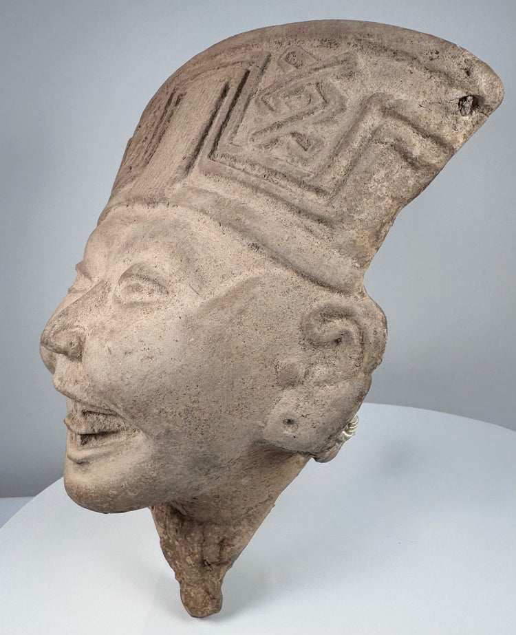Classic Veracruz smiling face head in buff terracotta with detailed facial modeling
