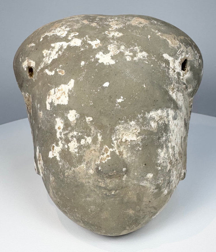 Chinese Ming Dynasty pottery head fragment with rounded cranium and weathered archaeological surface