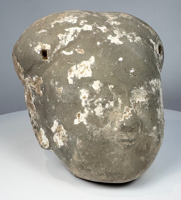 Ancient Chinese earthenware human head with pale slip remnants and mineral accretions