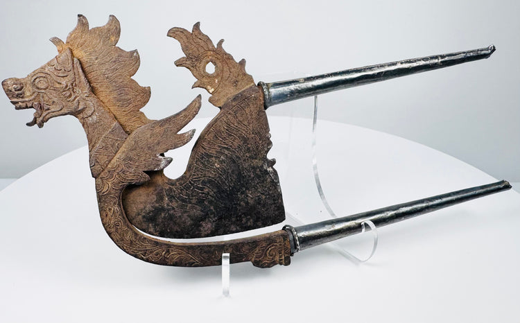 Balinese-style zoomorphic betel cutter with dragon-lion imagery, engraved blade and hinged construction