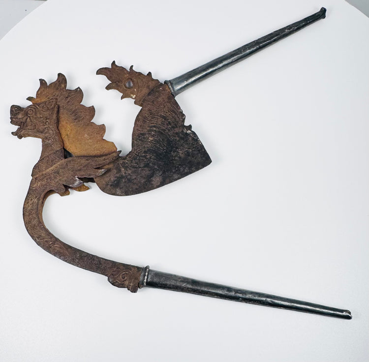 19th-century areca nut cutter with silver-covered handles and richly ornamented mythical creature form