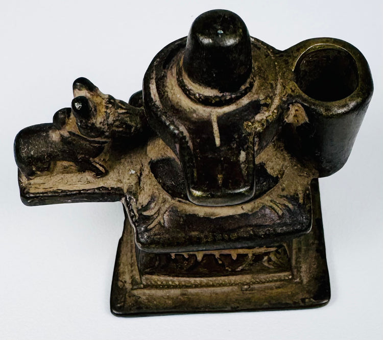 Antique Indian brass Shiva Lingam shrine with Nandi figure and stepped architectural pedestal.