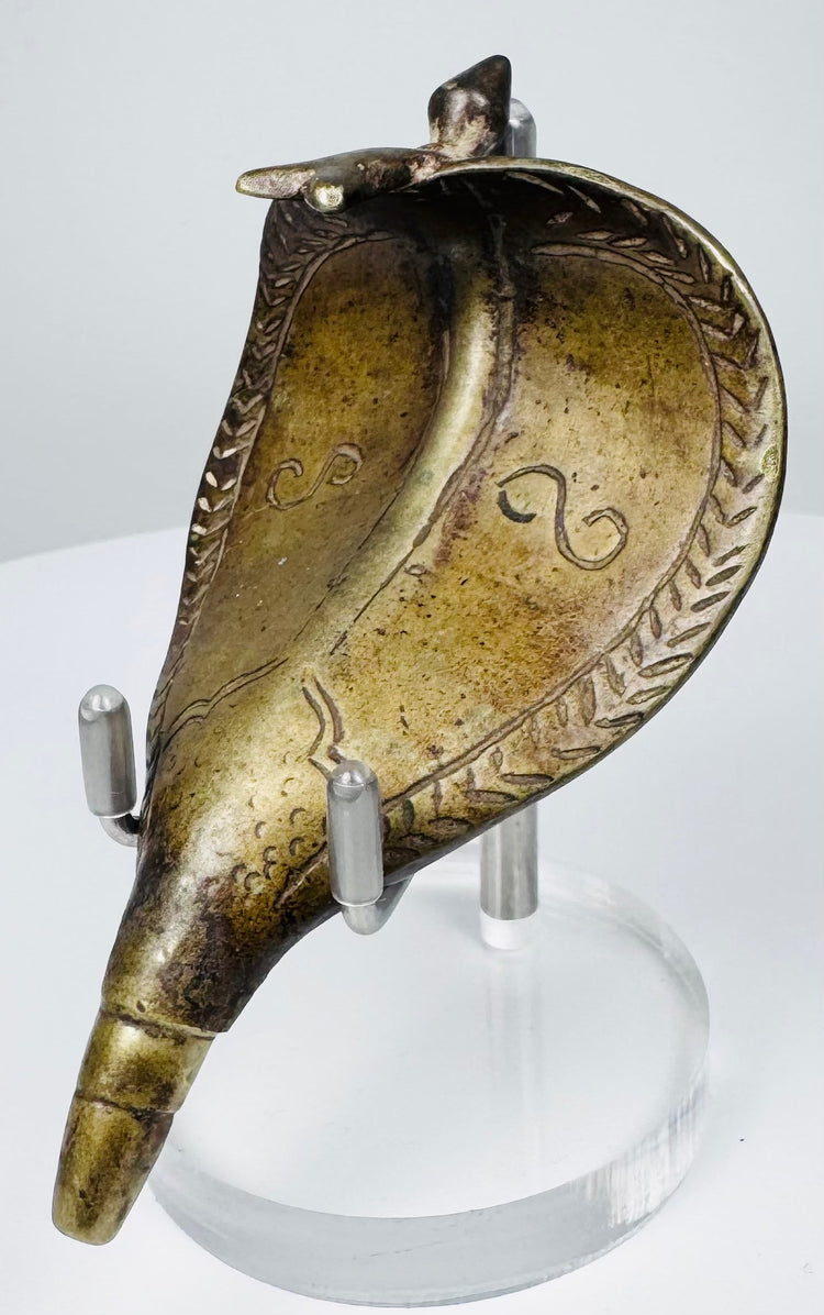 19th century Indian brass serpent canopy with stylized cobra head and tapered shrine mounting pin.