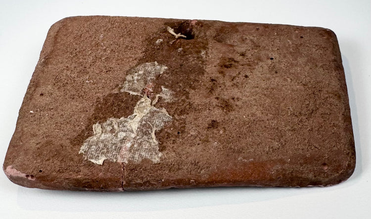 Shunga to Kushana period terracotta plaque from India depicting a large feline in profile with impressed body markings.