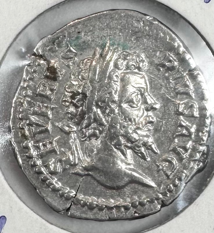 Roman silver denarius of Emperor Septimius Severus, AD 193–211, showing his laureate portrait and Latin inscription.
