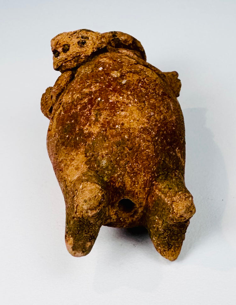 Pre-Columbian Maya musical figure in terracotta with perforated central object, circa 600–900 CE