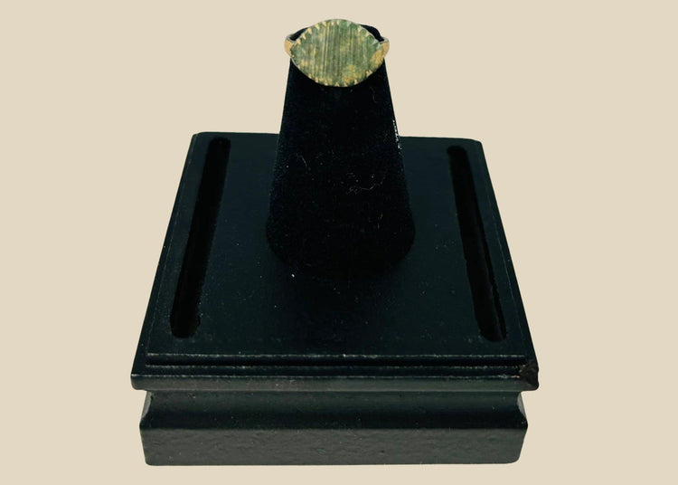 Imperial Roman bronze ring, circa 2nd–4th century AD, featuring incised linear decoration across its bezel; aged patina with green oxidation and surface wear from centuries of burial, historically used as both personal adornment and symbolic status marker within Roman society.