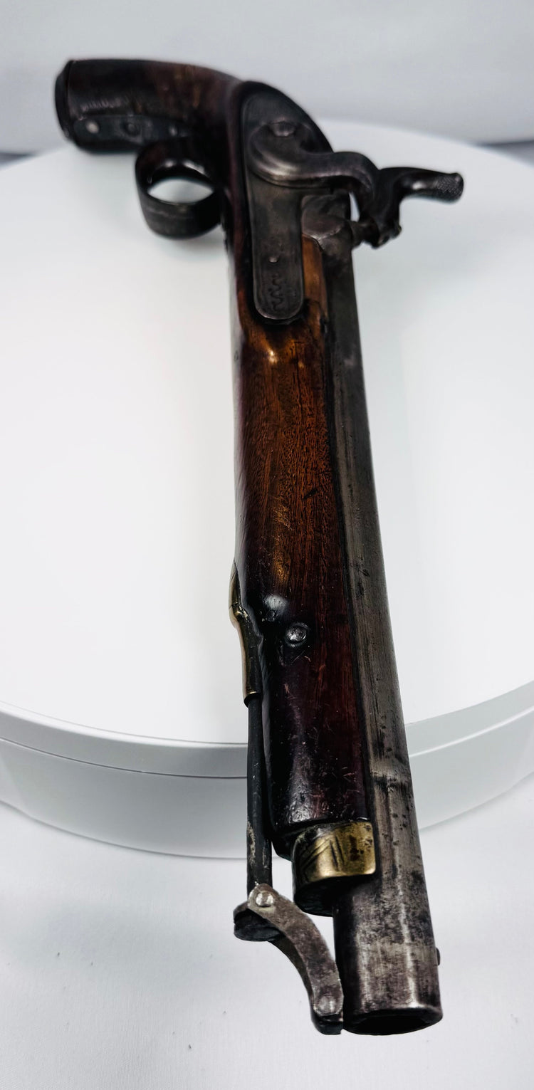 Nineteenth-century Northwest Frontier pistol with hardwood stock and iron lock mechanism
