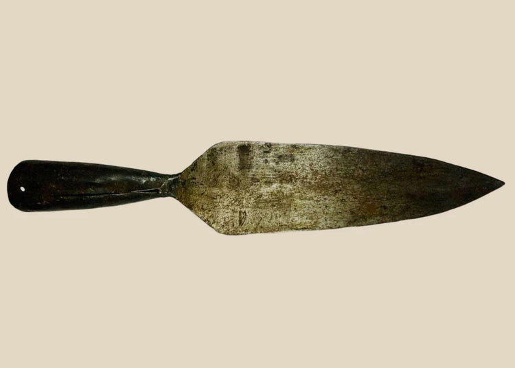 18th-century Indo-Persian forged iron spearhead with broad leaf-shaped blade, tapered socket, and aged patina.