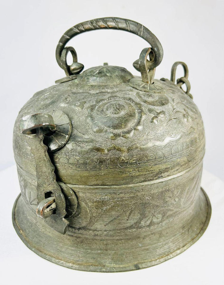 Indo-Persian metal censer, late 18th–early 19th century, with domed lid, floral and geometric engravings, chain attachments, and aged patina.