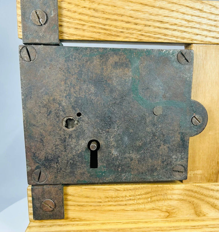 Vintage door rim lock mechanism with original iron key and hardware
