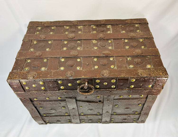1840-dated Iberian strongbox in Renaissance style with heavy iron construction, brass studs, and robust security design