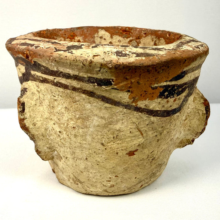 Profile of weathered antique mortar with rolled rim and lugs