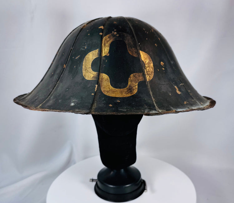 Edo period samurai travel helmet with black lacquer finish and broad flared brim