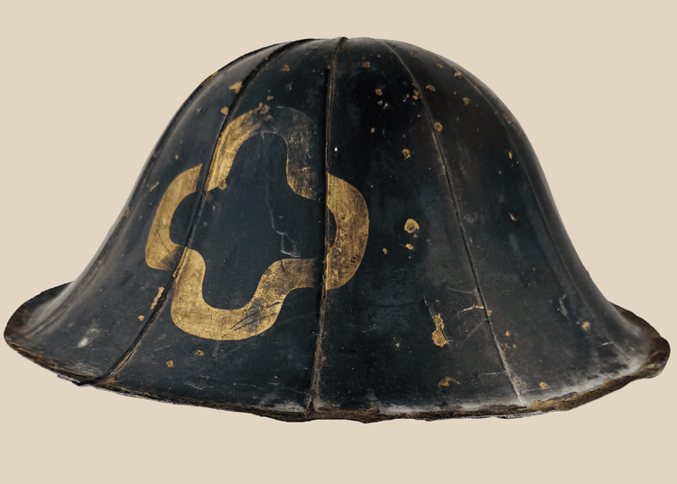 Antique Edo period Japanese jingasa samurai helmet with black lacquer and gilt mon crest