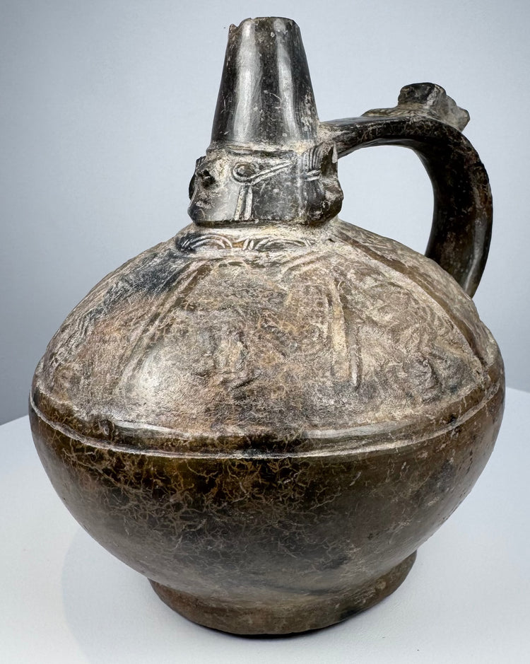 Ancient Peruvian blackware ceramic from the Lambayeque culture, dating to approximately 750–1375 AD.