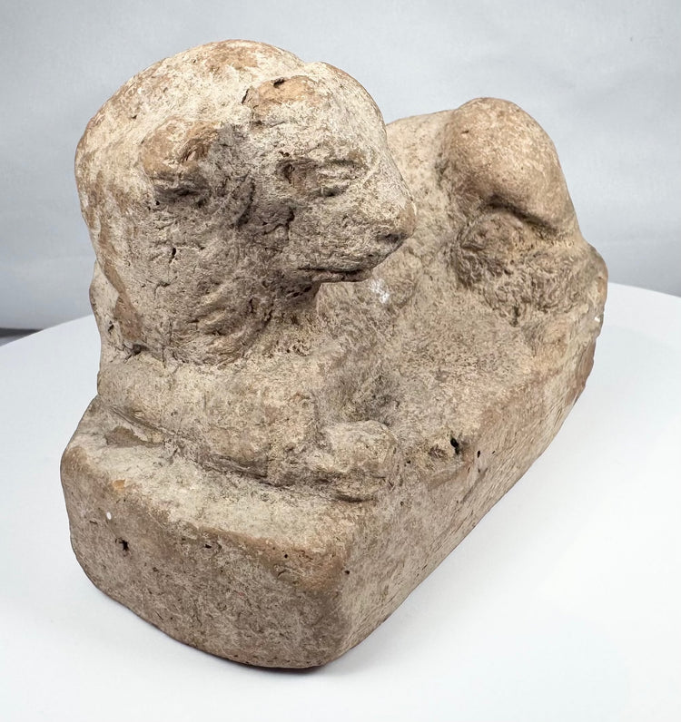 Ancient Egyptian lion sculpture in terracotta with hollow construction and integral base