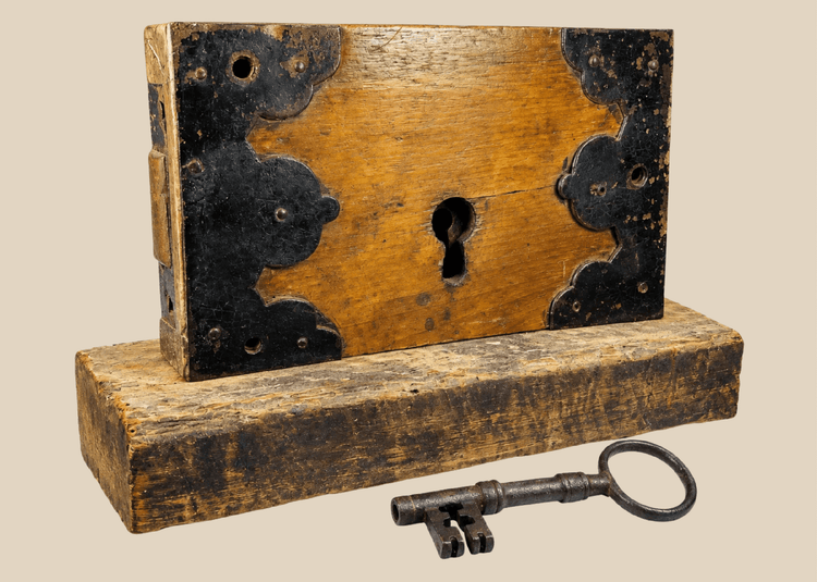 Early 19th century wooden rim lock with iron fittings and skeleton key