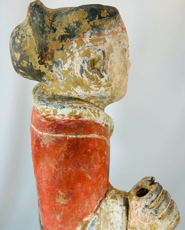 Han Dynasty tomb guardian figure with original polychrome surface remains