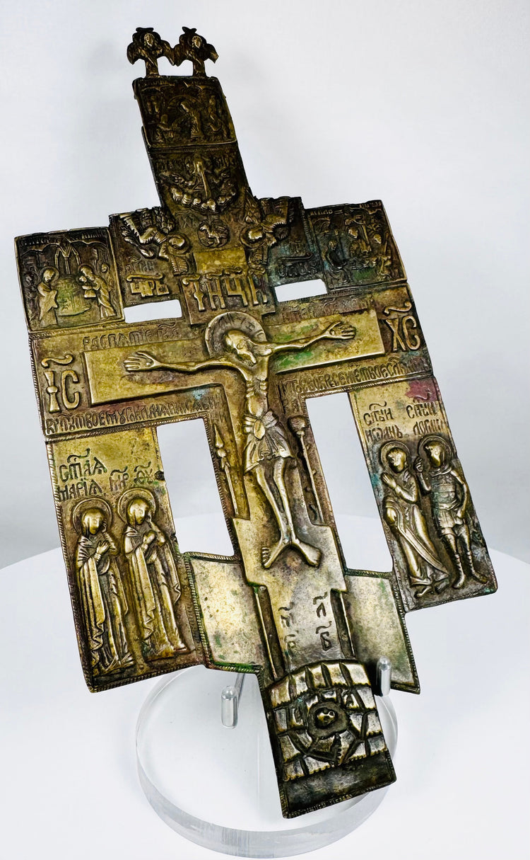 Imperial Russian religious bronze cross showcasing the Passion of Christ and traditional Orthodox symbolism.