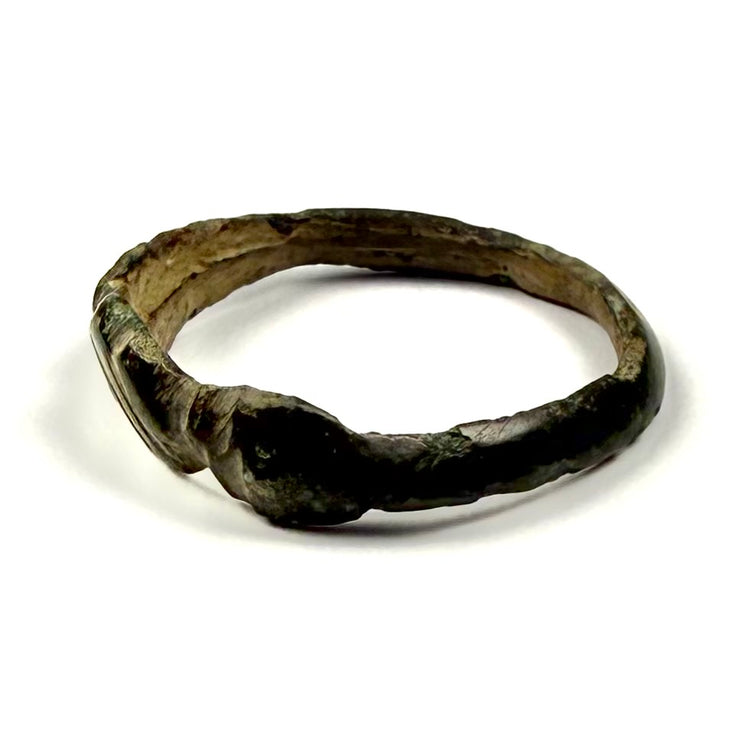 Rear view of Early Byzantine bronze ring showing irregular ancient hoop and age-related surface wear