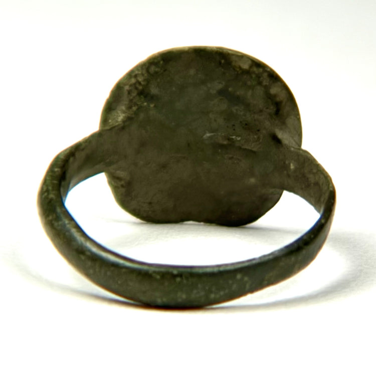 Rear view of Late Roman–Early Byzantine bronze finger ring showing solid bezel construction and circular band