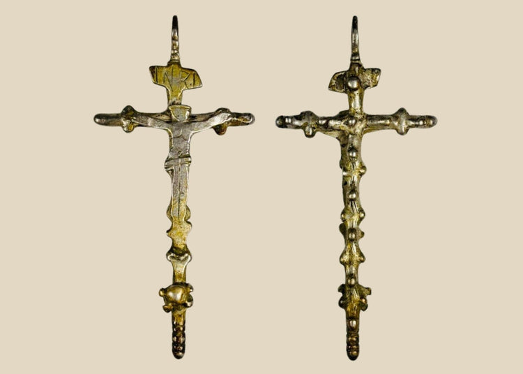 Antique silver crucifix pendant, circa 1780–1820, with sculpted Christ figure, INRI inscription, baroque-inspired detailing, and remnants of gilding. Southern European devotional piece used in Catholic ritual and personal devotion.
